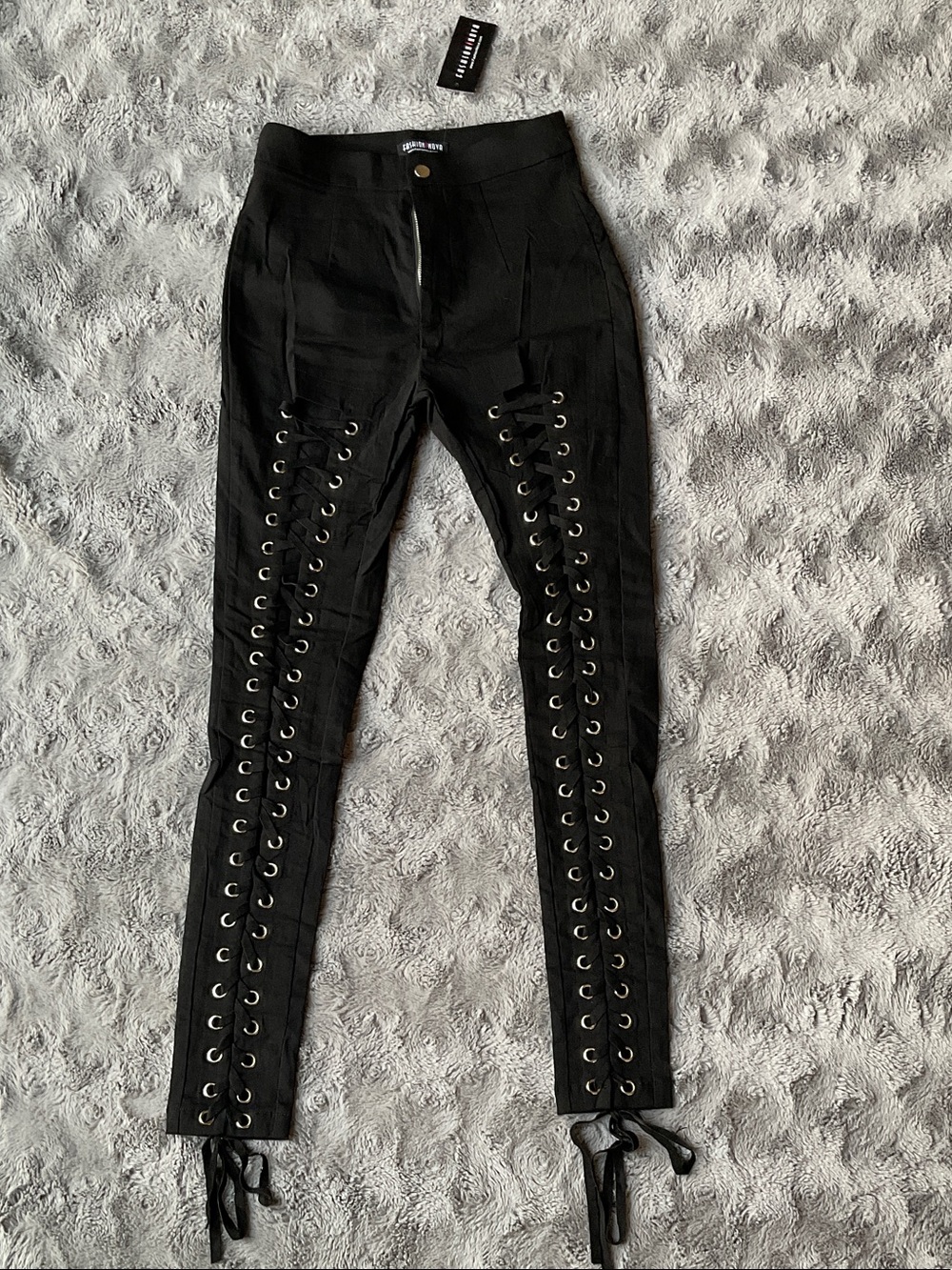 Black stylish stretchy pants with lace down front legs